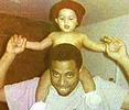 Kevin Chandler holding son Devon