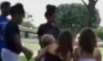 black attack on White woman holding baby